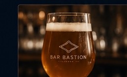 Ett glas öl på bardisken på Bar Bastion.